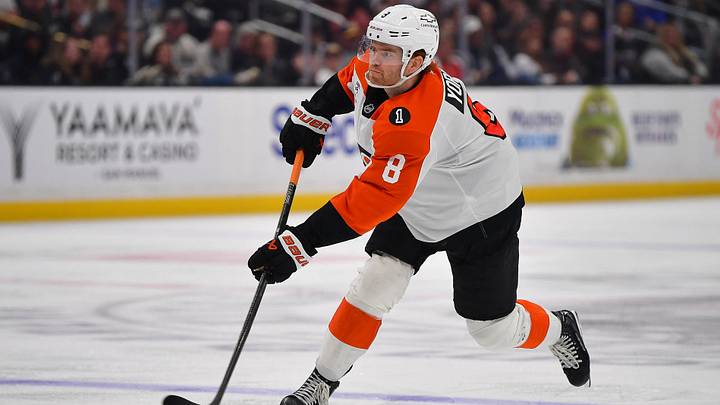 Mar 19, 2026; Los Angeles, California, USA; Philadelphia Flyers defenseman Cam York (8) shoots on goal against the Los Angeles Kings during the third period at Crypto.com Arena. Mandatory Credit: Gary A. Vasquez-Imagn Images