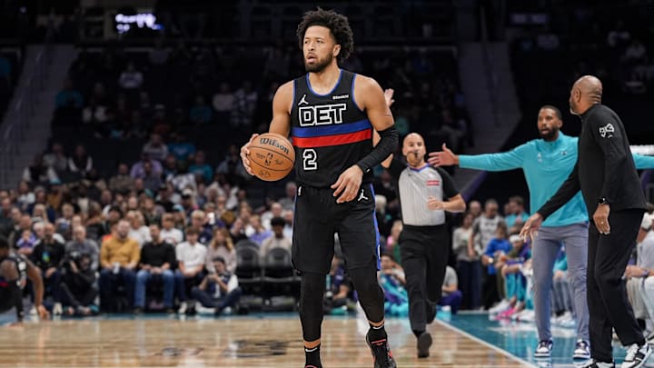 Nov 6, 2024; Charlotte, North Carolina, USA; Detroit Pistons guard Cade Cunningham (2) brings the ball up court against the Charlotte Hornets  during the first quarter at Spectrum Center. Mandatory Credit: Jim Dedmon-Imagn Images