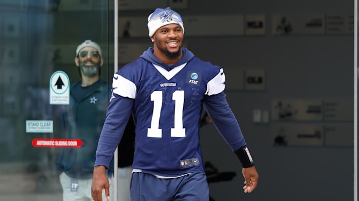 Dallas Cowboys defensive end Micah Parsons walks onto the practice field at the Ford Center.