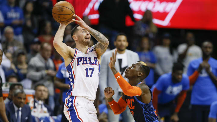 Feb 28, 2019; Oklahoma City, OK, USA; Oklahoma City Thunder guard Dennis Schroder (right) defends as Philadelphia 76ers guard JJ Redick (left) looks to pass during the second half at Chesapeake Energy Arena. Philadelphia won 108-104. Mandatory Credit: Alonzo Adams-USA TODAY Sports