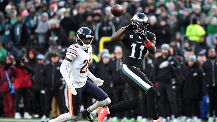 Nov 28, 2025; Philadelphia, Pennsylvania, USA; Philadelphia Eagles wide receiver A.J. Brown (11) makes a reception defended by Chicago Bears cornerback Nahshon Wright (26) during the second quarter of the game at Lincoln Financial Field. Mandatory Credit: Eric Hartline-Imagn Images