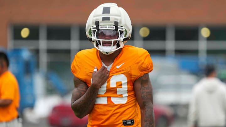 Tennessee defensive back Boo Carter (23) pulls on his jersey during Tennessee football preseason practice, in Knoxville, Tennessee, Aug. 6, 2025.