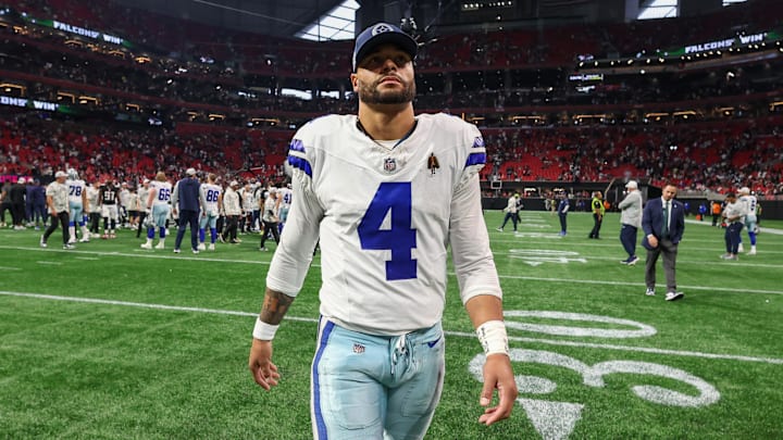 Dallas Cowboys quarterback Dak Prescott walks off the field after a game against the Atlanta Falcons at Mercedes-Benz Stadium. 