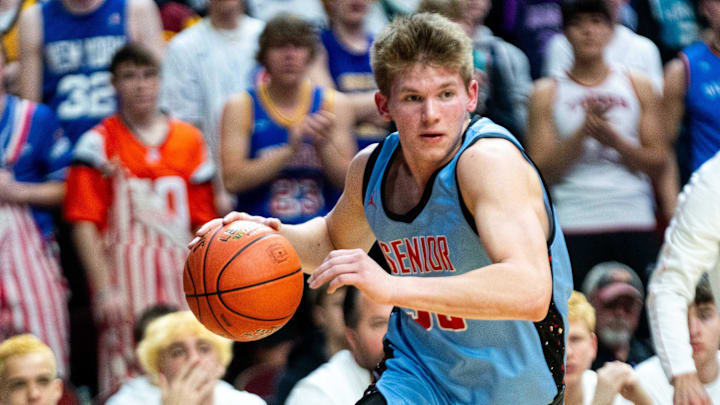 Dubuque Senior's Tevin Schultz drives down the baseline during the Class 4A boys state quarterfinal against Cedar Falls on Monday, March 10, 2025, at Wells Fargo Arena.