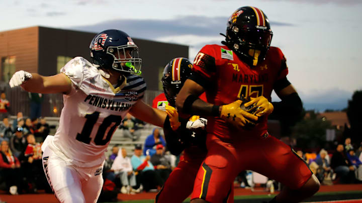Last season, Team Maryland beat Team Pennsylvania at the Big 33. Marian Catholic's Michael Gelatko, left, attempts to tackle Maryland's Cameron Allen-Jones in the end zone after he intercepted a pass during last year's game.