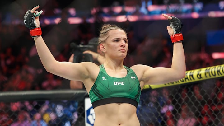 Nov 12, 2022; New York, NY, USA; Erin Blanchfield (red gloves) defeats Molly McCann (blue gloves)