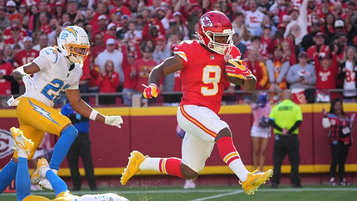 Oct 18, 2026; Kansas City, Missouri, USA; Kansas City Chiefs running back Kenneth Walker III (9) rushes and breaks a tackle from Los Angeles Chargers cornerback Tarheeb Still (4) during the first quarter at GEHA Field at Arrowhead Stadium. Mandatory Credit: Denny Medley-Imagn Images Oct 18, 2026; Kansas City, Missouri, USA; Kansas City Chiefs running back Kenneth Walker III (9) rushes and breaks a tackle from Los Angeles Chargers cornerback Tarheeb Still (4) during the first quarter at GEHA Field at Arrowhead Stadium. Mandatory Credit: Denny Medley-Imagn Images