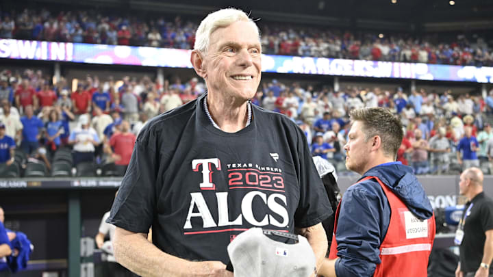 Texas Rangers owner Ray C. Davis smiles on field after the win against the Baltimore Orioles in game three of the ALDS for the 2023 MLB playoffs at Globe Life Field. 