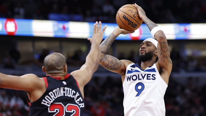 Minnesota Timberwolves guard Nickeil Alexander-Walker (9) shoots against Chicago Bulls forward Talen Horton-Tucker during the first half at United Center in Chicago on Nov. 7, 2024. Minnesota Timberwolves guard Nickeil Alexander-Walker (9) shoots against Chicago Bulls forward Talen Horton-Tucker during the first half at United Center in Chicago on Nov. 7, 2024.