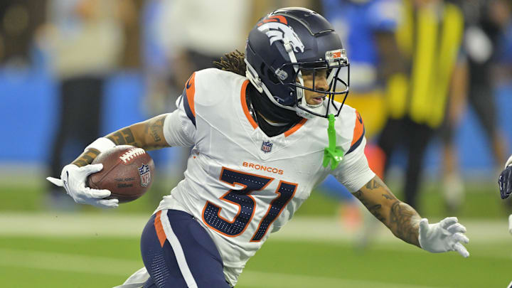 Dec 19, 2024; Inglewood, California, USA;  Denver Broncos cornerback Kris Abrams-Draine (31) runs the ball after an interception in the end zone in the first half against the Los Angeles Chargers at SoFi Stadium. 