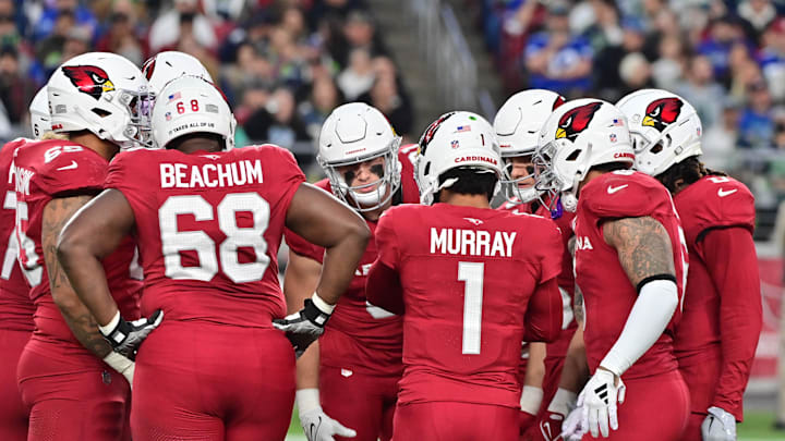 Jan 7, 2024; Glendale, Arizona, USA; Arizona Cardinals quarterback Kyler Murray (1) huddles with the
