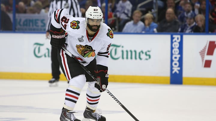 Jun 6, 2015; Tampa, FL, USA; Chicago Blackhawks defenseman Johnny Oduya (27) during the third period in game two of the 2015 Stanley Cup Final at Amalie Arena. Tampa Bay Lightning defeated the Chicago Blackhawks Mandatory Credit: Kim Klement-Imagn Images Jun 6, 2015; Tampa, FL, USA; Chicago Blackhawks defenseman Johnny Oduya (27) during the third period in game two of the 2015 Stanley Cup Final at Amalie Arena. Tampa Bay Lightning defeated the Chicago Blackhawks Mandatory Credit: Kim Klement-Imagn Images