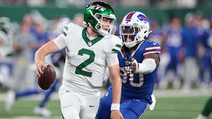 Sep 11, 2023; East Rutherford, New Jersey, USA; New York Jets quarterback Zach Wilson (2) avoids
