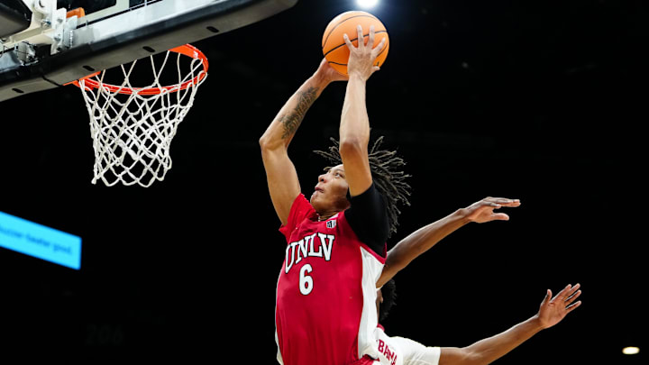 UNLV Rebels forward Tyrin Jones (6) dunks the ball in the second half against Alabama Crimson Tide in a 2025 Players Era Festival group play game at MGM Grand Garden Arena. Mandatory Credit: Stephen R. Sylvanie-Imagn Images
