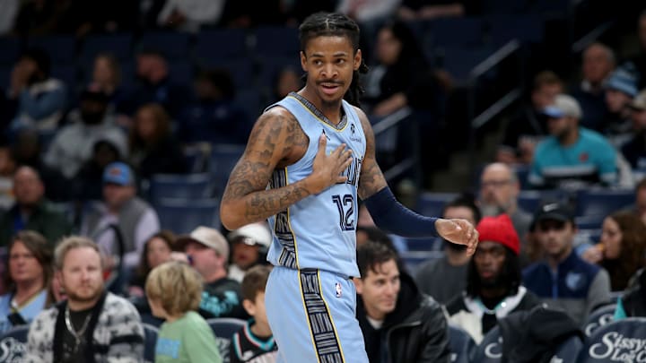 Jan 21, 2026; Memphis, Tennessee, USA; Memphis Grizzlies guard Ja Morant (12) reacts during the first quarter against the Atlanta Hawks at FedExForum. 