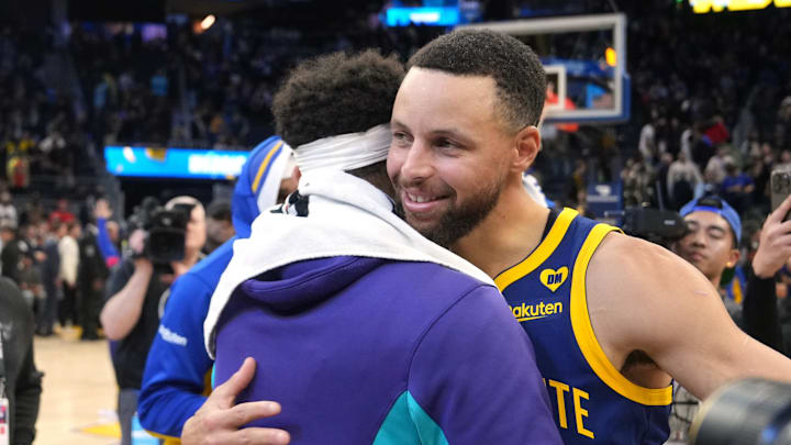 Feb 23, 2024; San Francisco, California, USA; Golden State Warriors guard Stephen Curry (right) hugs Charlotte Hornets guard Seth Curry (left) after the game at Chase Center. Mandatory Credit: Darren Yamashita-Imagn Images Feb 23, 2024; San Francisco, California, USA; Golden State Warriors guard Stephen Curry (right) hugs Charlotte Hornets guard Seth Curry (left) after the game at Chase Center. Mandatory Credit: Darren Yamashita-Imagn Images