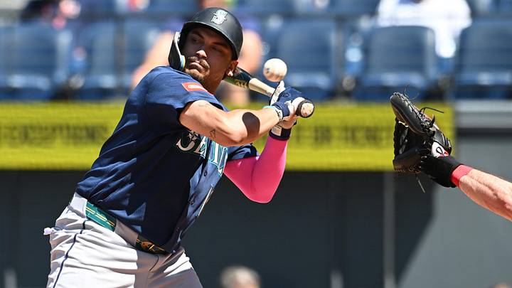 Jun 28, 2026: Seattle Mariners first baseman Josh Naylor (12) is hit by a pitch during the sixth inning against the Cleveland Guardians at Progressive Field. 