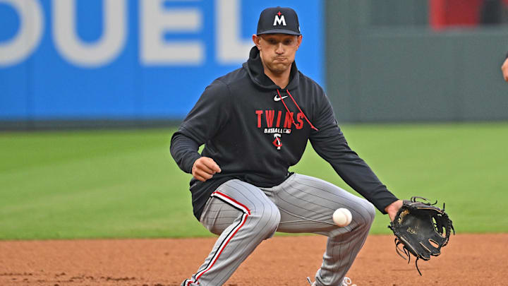 Apr 1, 2026; Kansas City, Missouri, USA; Minnesota Twins shortstop Brooks Lee (22) fields a ground ball during pre-game against the Kansas City Royals at Kauffman Stadium. Mandatory Credit: Peter Aiken-Imagn Images Apr 1, 2026; Kansas City, Missouri, USA; Minnesota Twins shortstop Brooks Lee (22) fields a ground ball during pre-game against the Kansas City Royals at Kauffman Stadium. Mandatory Credit: Peter Aiken-Imagn Images