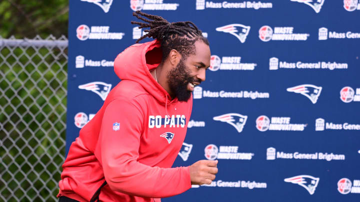 Jun 12, 2024; Foxborough, MA, USA;  New England Patriots linebacker Matthew Judon (9) runs onto the practice field at minicamp at Gillette Stadium.  Mandatory Credit: Eric Canha-USA TODAY Sports