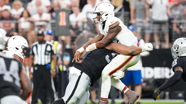 Sep 29, 2024; Paradise, Nevada, USA; Las Vegas Raiders defensive tackle Christian Wilkins (94) hits Cleveland Browns quarterback Deshaun Watson (4) during the fourth quarter at Allegiant Stadium. Mandatory Credit: Stephen R. Sylvanie-Imagn Images