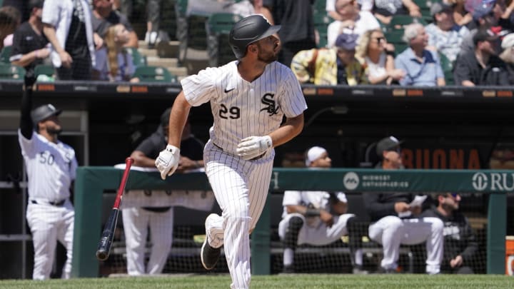 Jun 9, 2024; Chicago, Illinois, USA; Chicago White Sox shortstop Paul DeJong (29) hits a three-run home run against the Boston Red Sox during the fourth inning at Guaranteed Rate Field. Mandatory Credit: David Banks-USA TODAY Sports