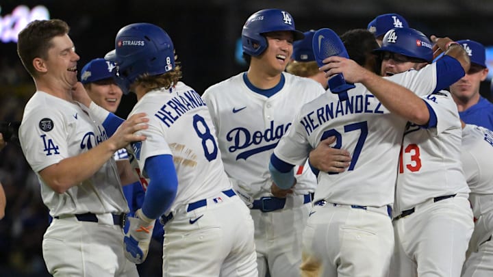 Oct 9, 2025; Los Angeles, California, USA; Los Angeles Dodgers catcher Will Smith (16), third baseman Enrique Hernández (8), designated hitter player Shohei Ohtani (17), right fielder Teoscar Hernández (37) and third baseman Max Muncy (13) celebrate after defeating the Philadelphia Phillies in game four of the NLDS during the 2025 MLB playoffs at Dodger Stadium. Mandatory Credit: Jayne Kamin-Oncea-Imagn Images Oct 9, 2025; Los Angeles, California, USA; Los Angeles Dodgers catcher Will Smith (16), third baseman Enrique Hernández (8), designated hitter player Shohei Ohtani (17), right fielder Teoscar Hernández (37) and third baseman Max Muncy (13) celebrate after defeating the Philadelphia Phillies in game four of the NLDS during the 2025 MLB playoffs at Dodger Stadium. Mandatory Credit: Jayne Kamin-Oncea-Imagn Images