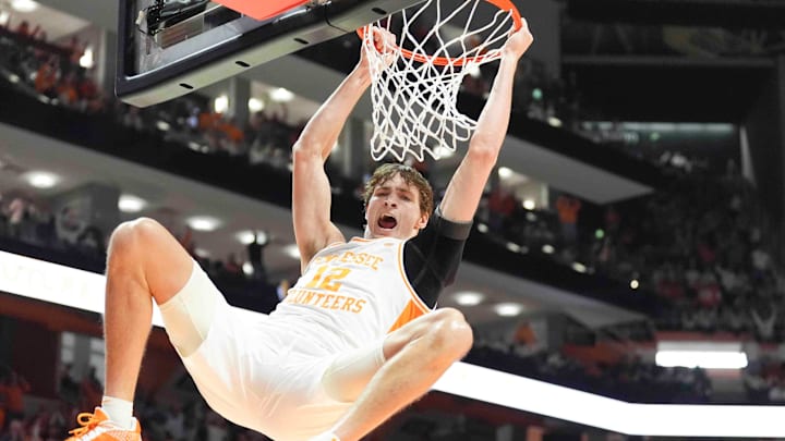 Tennessee's Cade Phillips (12) dunks the ball during an NCAA college basketball game between Tennessee and Florida in Knoxville, Tenn., Saturday, Feb. 1, 2025. Tennessee defeated Florida.