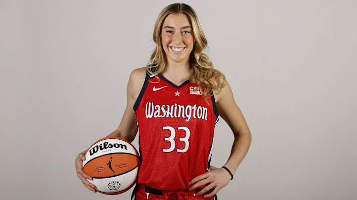 Apr 28, 2025; Washington, DC, USA; Washington Mystics guard Lucy Olsen (33) poses for a portrait during Mystics Media Day at CareFirst Arena. Mandatory Credit: Geoff Burke-Imagn Images