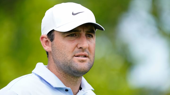 Scottie Scheffler walks from the sixth tee during the first round of the Charles Schwab Challenge golf tournament. Scottie Scheffler walks from the sixth tee during the first round of the Charles Schwab Challenge golf tournament.