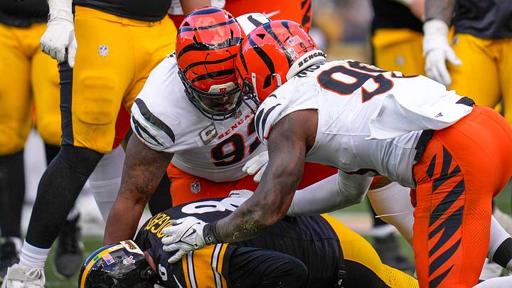 Cincinnati Bengals defensive tackle B.J. Hill (92) and defensive end Myles Murphy (99) sack Pittsburgh Steelers quarterback Aaron Rodgers (8) in the second quarter of the NFL Week 11 game between the Pittsburgh Steelers and the Cincinnati Bengals at Acrisure Stadium in Pittsburgh on Sunday, Nov. 16, 2025. The Steelers led 10-6 at halftime. Cincinnati Bengals defensive tackle B.J. Hill (92) and defensive end Myles Murphy (99) sack Pittsburgh Steelers quarterback Aaron Rodgers (8) in the second quarter of the NFL Week 11 game between the Pittsburgh Steelers and the Cincinnati Bengals at Acrisure Stadium in Pittsburgh on Sunday, Nov. 16, 2025. The Steelers led 10-6 at halftime.