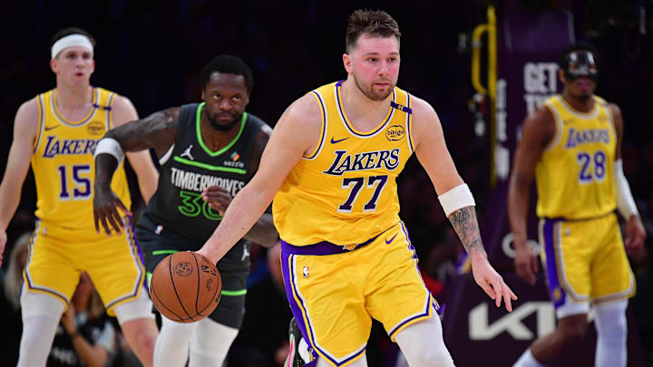 Apr 30, 2025; Los Angeles, California, USA; Los Angeles Lakers guard Luka Doncic (77) moves the ball up court against the Minnesota Timberwolves during the first half in game five of first round for the 2025 NBA Playoffs at Crypto.com Arena. Mandatory Credit: Gary A. Vasquez-Imagn Images