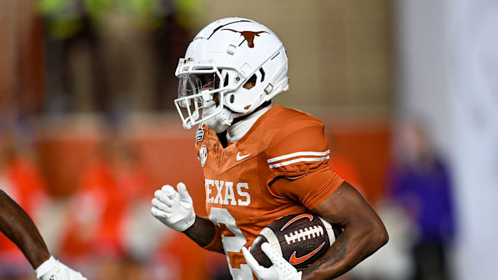 Matthew Golden runs the ball during a CFP matchup between the Texas Longhorns and Clemson Tigers