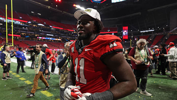 Dec 7, 2024; Atlanta, GA, USA; Georgia Bulldogs linebacker Jalon Walker (11) reacts after defeating the Texas Longhorns in overtime in the 2024 SEC Championship game at Mercedes-Benz Stadium. Mandatory Credit: Brett Davis-Imagn Images