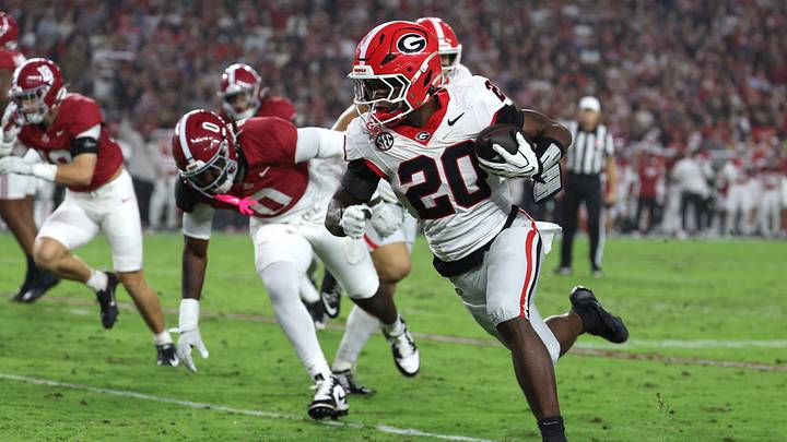 Oct 10, 2026; Tuscaloosa, Alabama, USA; Georgia Bulldogs running back Dwight Phillips Jr. (20) carries the ball against the Alabama Crimson Tide during the first quarter at Saban Field at Bryant-Denny Stadium. Mandatory Credit: David Leong-Imagn Images Oct 10, 2026; Tuscaloosa, Alabama, USA; Georgia Bulldogs running back Dwight Phillips Jr. (20) carries the ball against the Alabama Crimson Tide during the first quarter at Saban Field at Bryant-Denny Stadium. Mandatory Credit: David Leong-Imagn Images