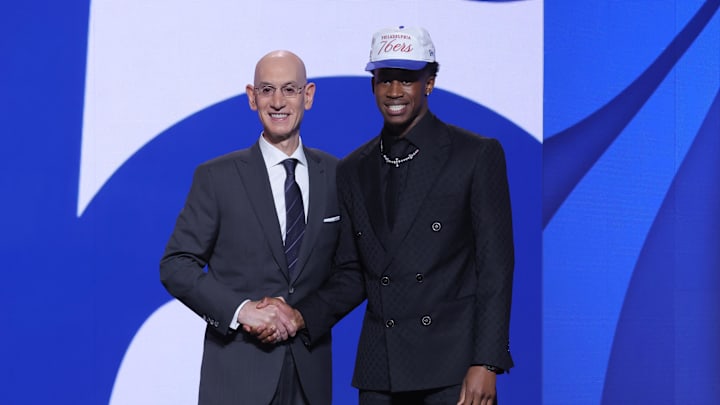 Jun 25, 2025; Brooklyn, NY, USA;  VJ Edgecombe stands with NBA commissioner Adam Silver after being selected as the third pick by the Philadelphia 76ers in the first round of the 2025 NBA Draft at Barclays Center. Mandatory Credit: Brad Penner-Imagn Images