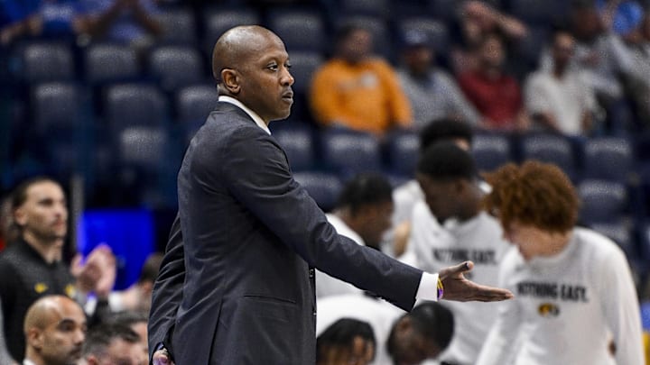 Mar 13, 2025; Nashville, TN, USA; Missouri Tigers head coach Dennis Gates holds his hand out after a made three point basket against the Mississippi State Bulldogs during the first half at Bridgestone Arena. Mandatory Credit: Steve Roberts-Imagn Images Mar 13, 2025; Nashville, TN, USA; Missouri Tigers head coach Dennis Gates holds his hand out after a made three point basket against the Mississippi State Bulldogs during the first half at Bridgestone Arena. Mandatory Credit: Steve Roberts-Imagn Images