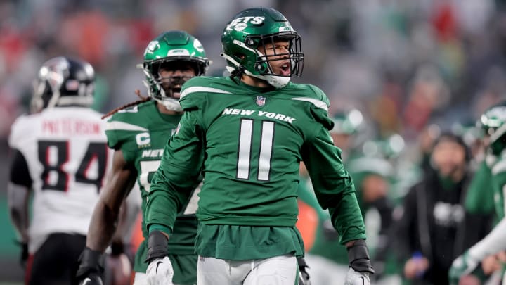 Dec 3, 2023; East Rutherford, New Jersey, USA; New York Jets linebacker Jermaine Johnson (11) reacts during the fourth quarter against the Atlanta Falcons at MetLife Stadium.