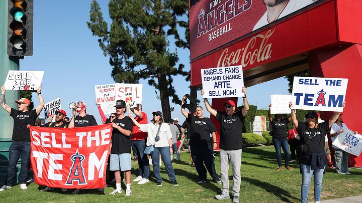 May 23, 2026; Anaheim, California, USA; Los Angeles Angels fans gather outside Angel Stadium before the game between the Los Angeles Angels and the Texas Rangers to protest the Angels team owner Arte Moreno. Mandatory Credit: Kiyoshi Mio-Imagn Images May 23, 2026; Anaheim, California, USA; Los Angeles Angels fans gather outside Angel Stadium before the game between the Los Angeles Angels and the Texas Rangers to protest the Angels team owner Arte Moreno. Mandatory Credit: Kiyoshi Mio-Imagn Images