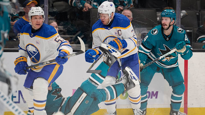 Jan 27, 2024; San Jose, California, USA; Buffalo Sabres right wing Kyle Okposo (21) checks San Jose