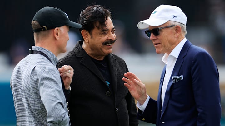 From left, Jets co-owner Christopher Johnson, Jacksonville Jaguars owner Shad Khan and Jets co-owner Woody Johnson speak before an NFL football matchup Sunday, Dec. 15, 2024 at EverBank Stadium in Jacksonville, Fla.