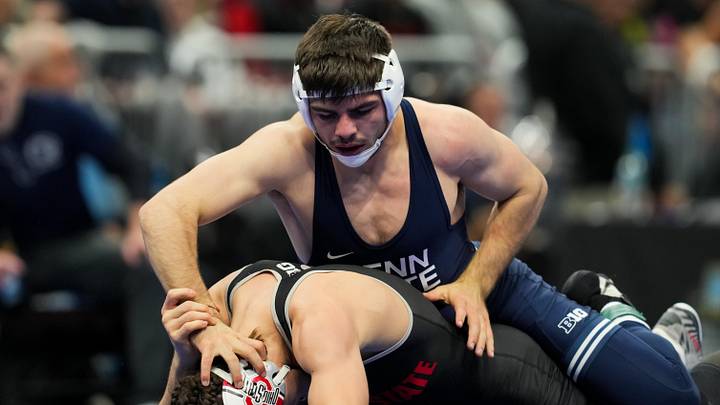 Mar 20, 2026; Cleveland, OH, USA;  Penn State Nittany Lions PJ Duke competes against Ohio State Buckeyes Brandon Cannon during the NCAA DI Wrestling Championship at Rocket Arena. Mandatory Credit: Aaron Doster-Imagn Images