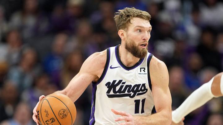Dec 30, 2024; Sacramento, California, USA; Sacramento Kings forward Domantas Sabonis (11) dribbles against the Dallas Mavericks during the third quarter at Golden 1 Center.