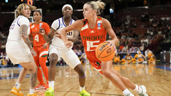 Mar 26, 2023; Greenville, SC, USA; Miami Hurricanes guard Hanna Cavinder (15) drives to the basket against the LSU Lady Tigers during the second half of the NCAA Women   s Tournament at Bon Secours Wellness Arena. 