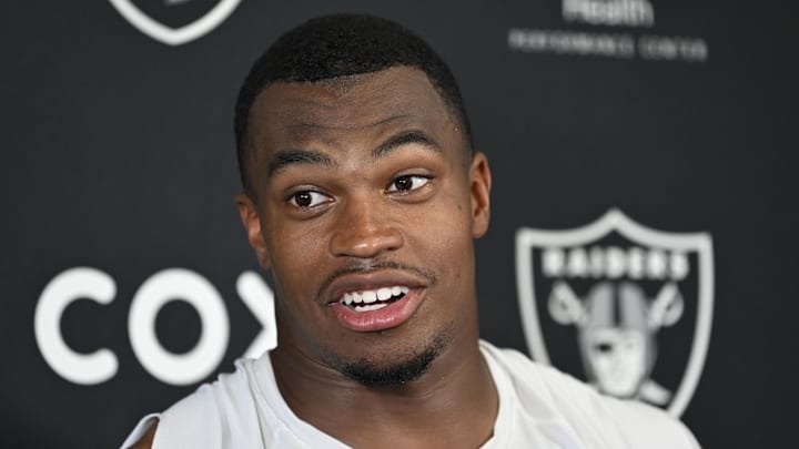 Former Las Vegas Raiders defensive end Tyree Wilson speaks to the media.