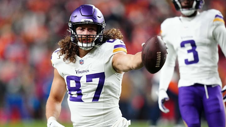 Nov 19, 2023; Denver, Colorado, USA; Minnesota Vikings tight end T.J. Hockenson (87) reacts after making a catch against the Denver Broncos in the first half at Empower Field at Mile High.