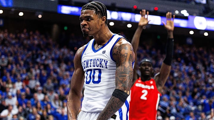Feb 17, 2026; Lexington, Kentucky, USA; Kentucky Wildcats guard Otega Oweh (00) reacts after scoring a basket and being fouled during the second half against the Georgia Bulldog at Rupp Arena at Central Bank Center. Mandatory Credit: Jordan Prather-Imagn Images
