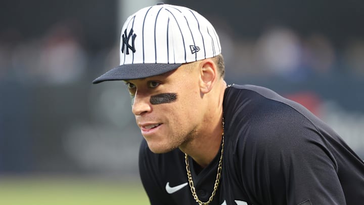 Mar 3, 2025; Tampa, Florida, USA; New York Yankees outfielder Aaron Judge (99) looks on as he warms up against the Pittsburgh Pirates at George M. Steinbrenner Field. Mar 3, 2025; Tampa, Florida, USA; New York Yankees outfielder Aaron Judge (99) looks on as he warms up against the Pittsburgh Pirates at George M. Steinbrenner Field.
