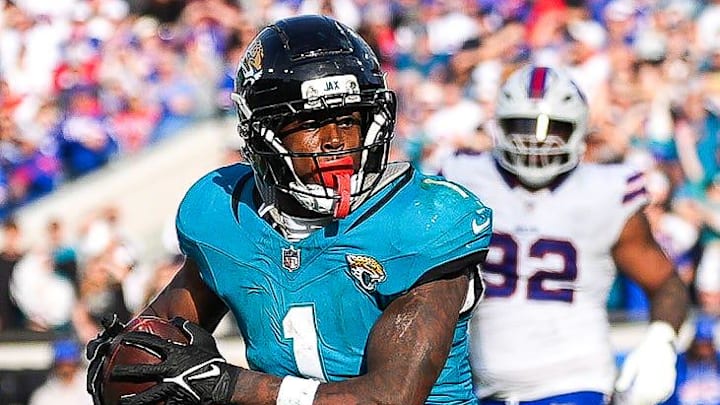 Jacksonville Jaguars running back Travis Etienne Jr. (1) runs towards the end zone during the fourth quarter in an NFL football AFC Wild Card playoff matchup, Sunday, Jan. 11, 2026, in Jacksonville, Fla. Bills lead 10-7 at the half over the Jaguars. The Bills defeated the Jaguars 27-24. 