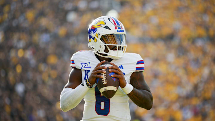 Sep 6, 2025; Columbia, Missouri, USA; Kansas Jayhawks quarterback Jalon Daniels (6) warms up during the second half against the Missouri Tigers at Faurot Field at Memorial Stadium. Mandatory Credit: Jay Biggerstaff-Imagn Images