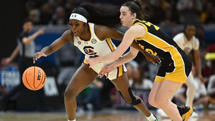 South Carolina basketball guard Raven Johnson ripping the handle of Iowa star Caitlin Clark in the National Championship Game